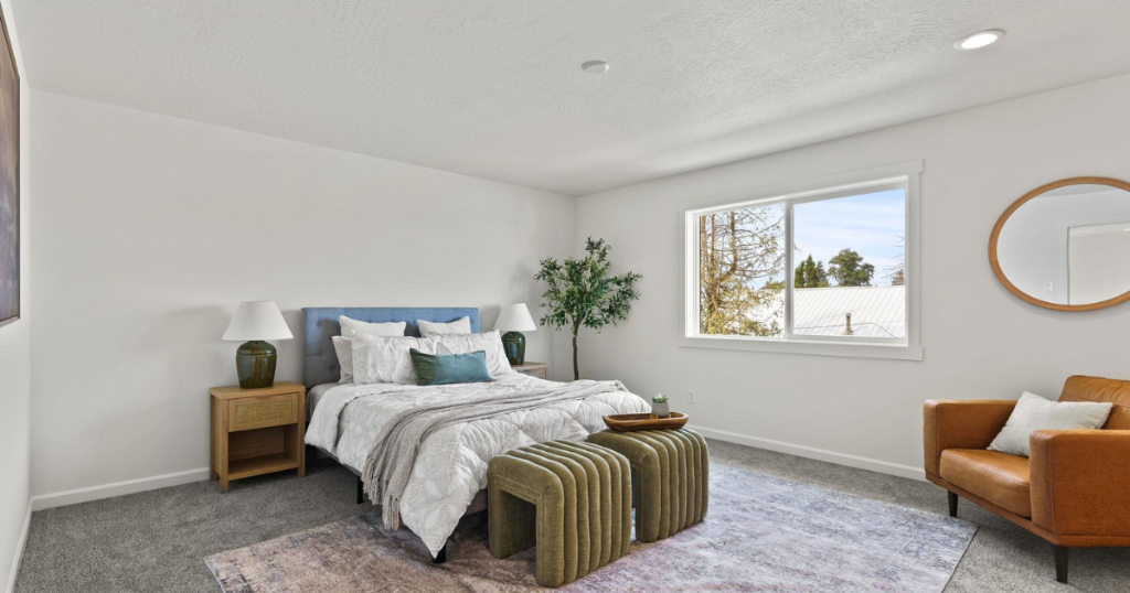 Primary Bedroom — Blue Headboard & Greenery