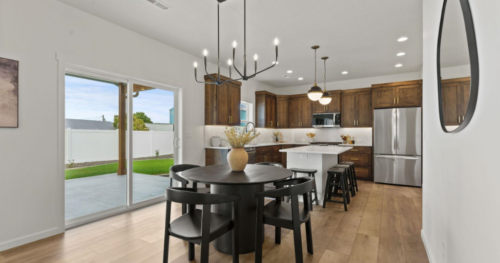 Dining Area — Black Chandelier & Backyard Views