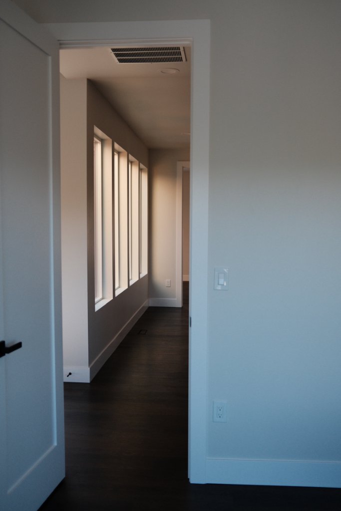 Hallway — Floor-to-Ceiling Windows
