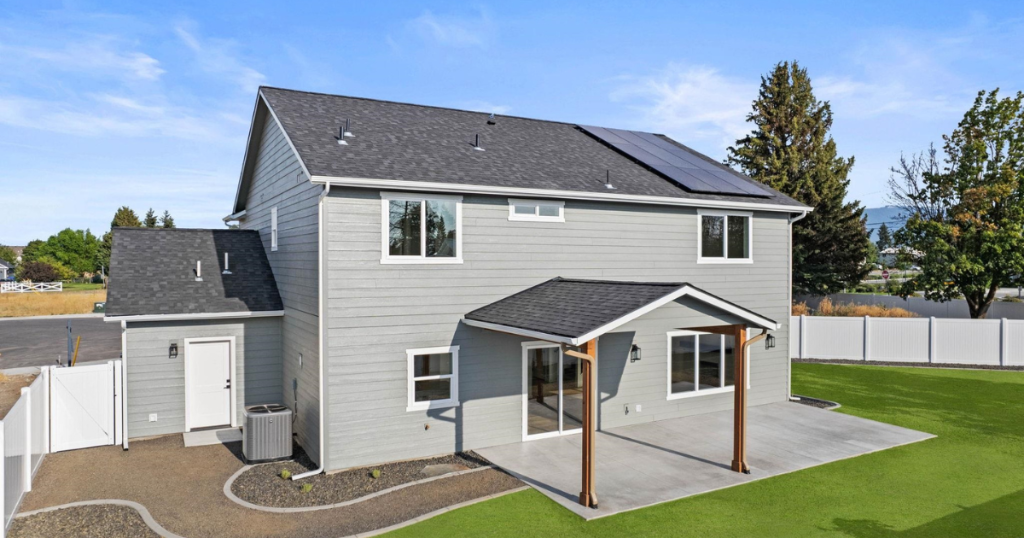 Exterior Rear — Solar Panels & Covered Patio