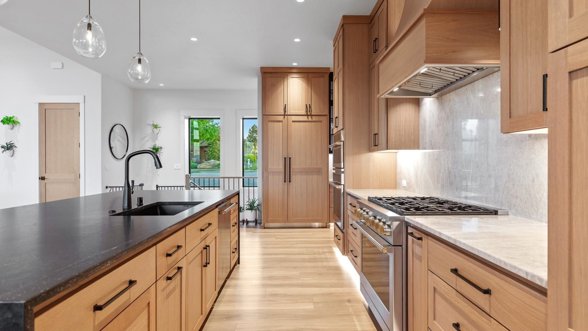Kitchen — Island & Range with Marble Backsplash