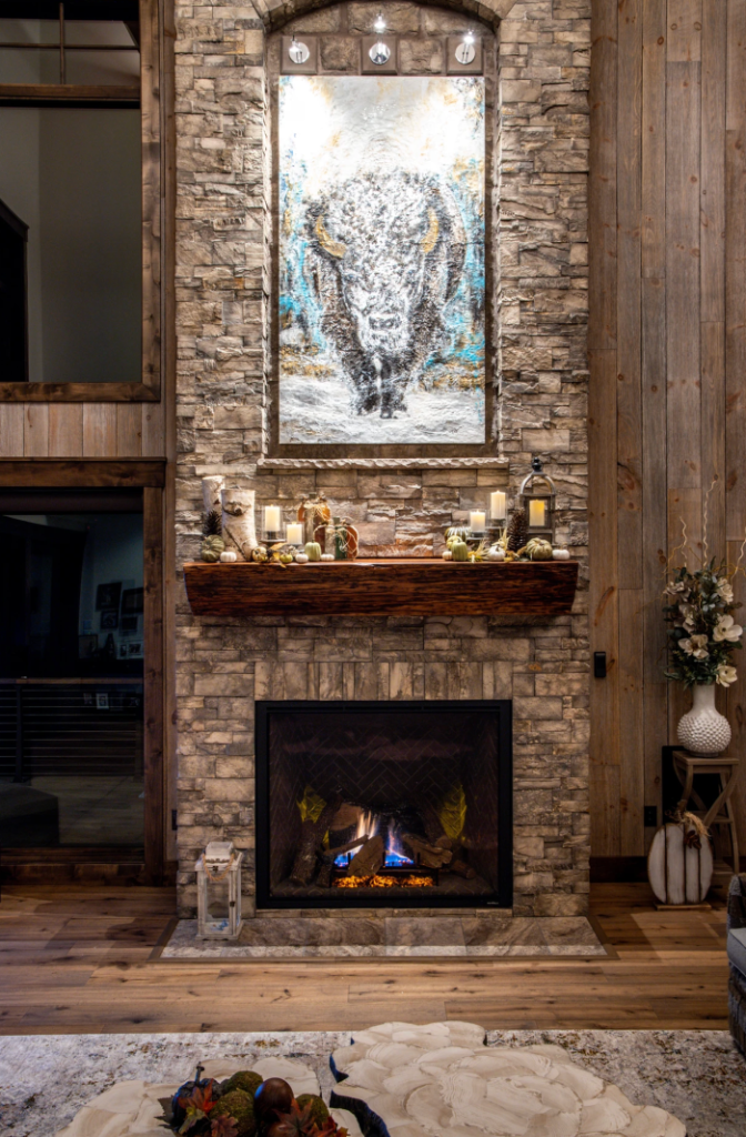 Living Room — Stone Fireplace with Bison Art