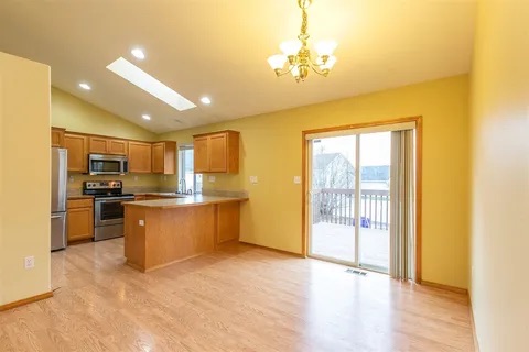 Before — Yellow Walls & Oak Cabinetry