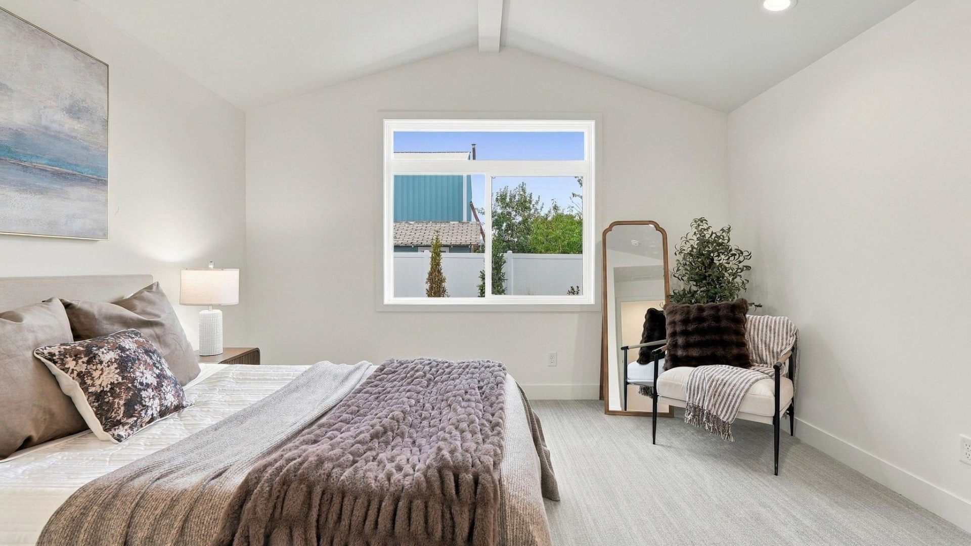 Primary Bedroom — Window View & Floor Mirror