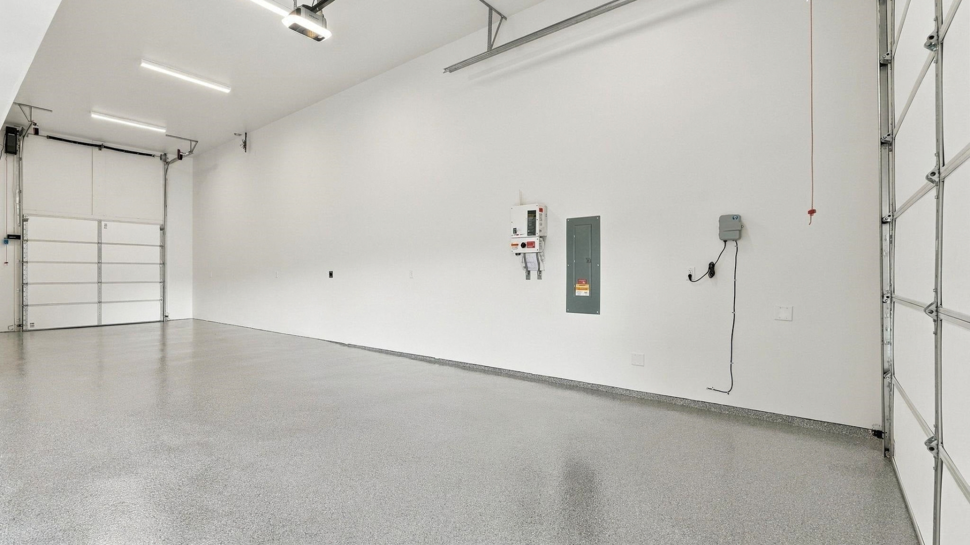 Garage — Epoxy Floor & White Doors