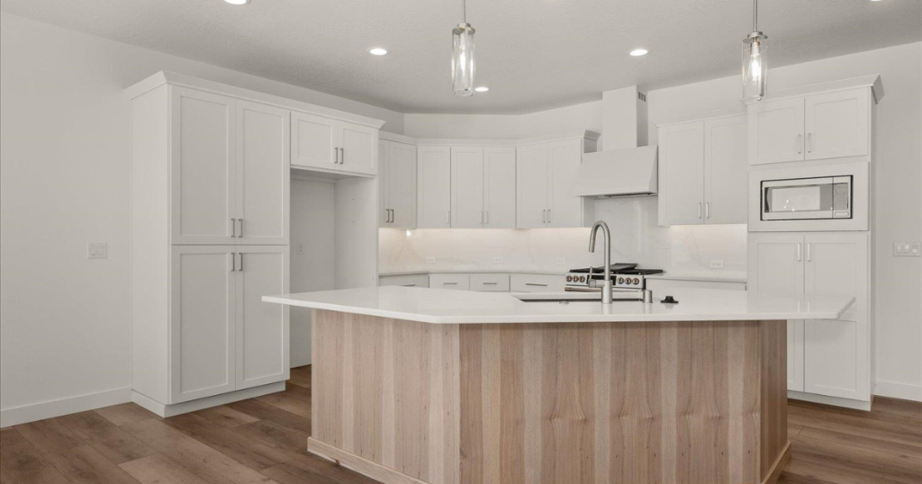 Kitchen — Shaker Cabinetry & Quartz Counters