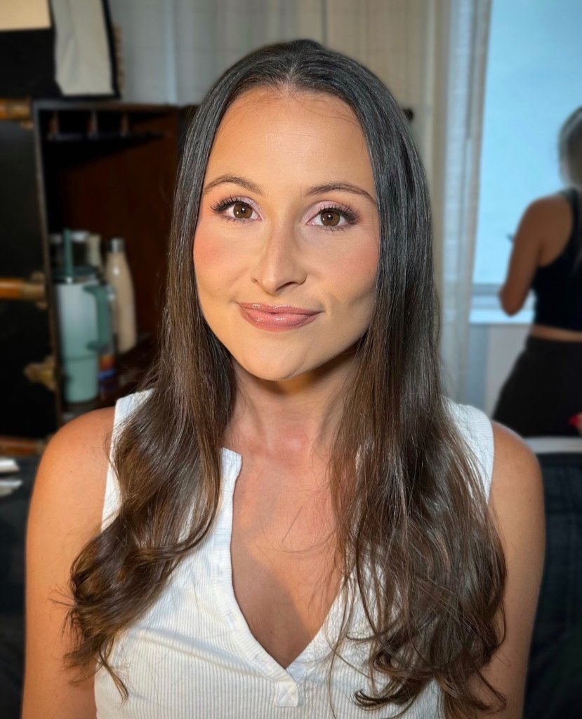 Girl with middle part white tank