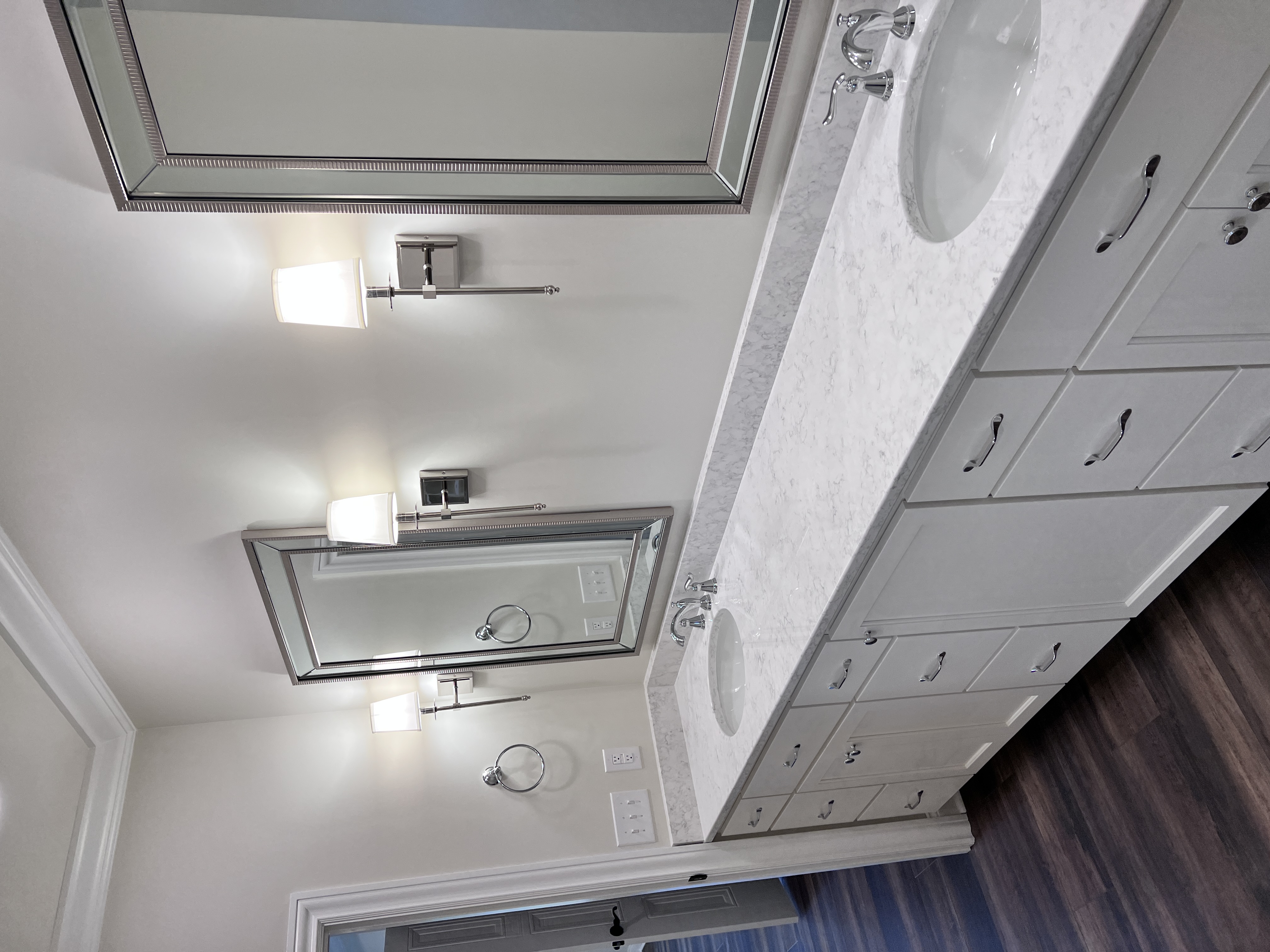 Double vanity with sconces