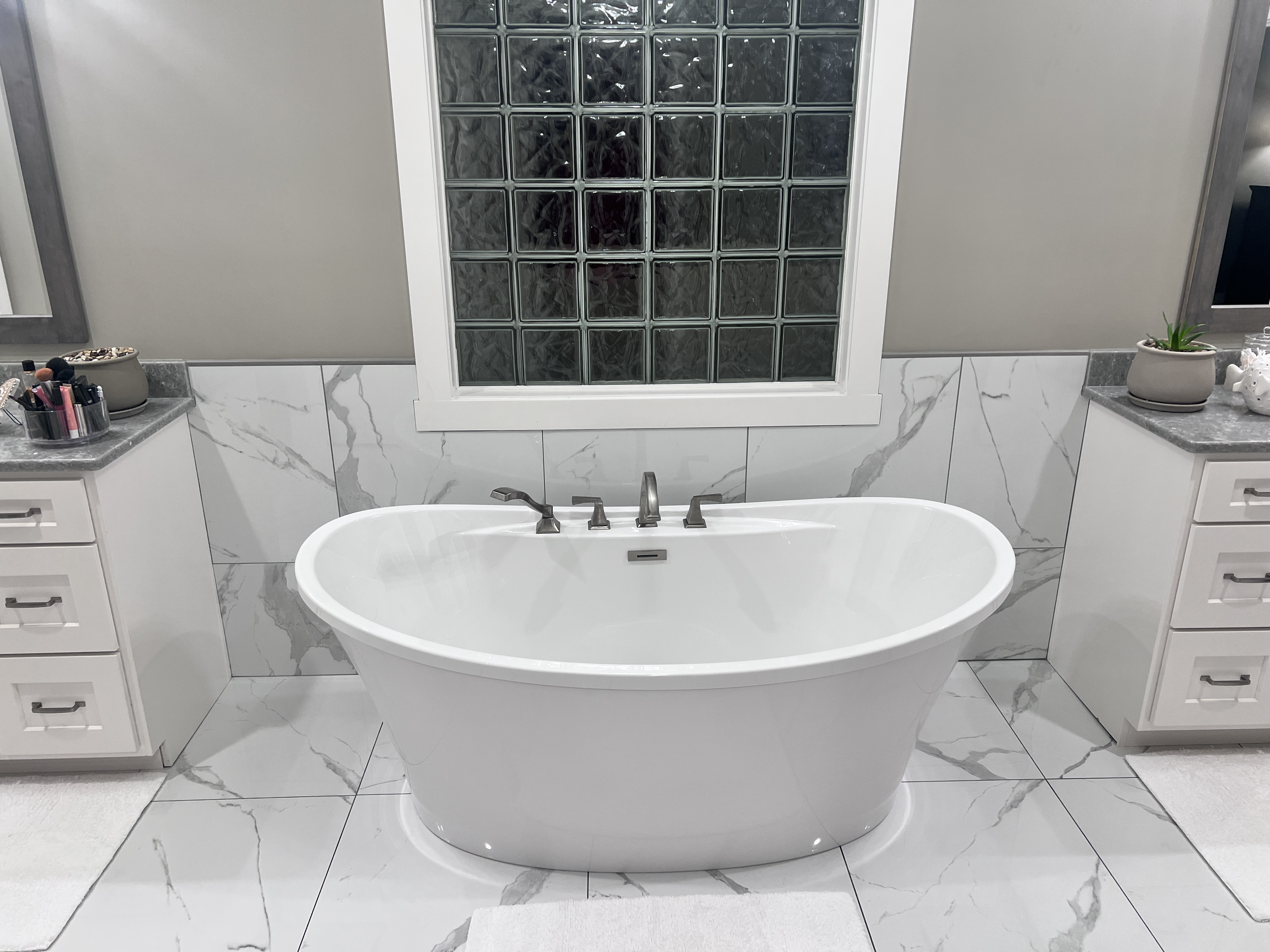 Tub in front of glass block window