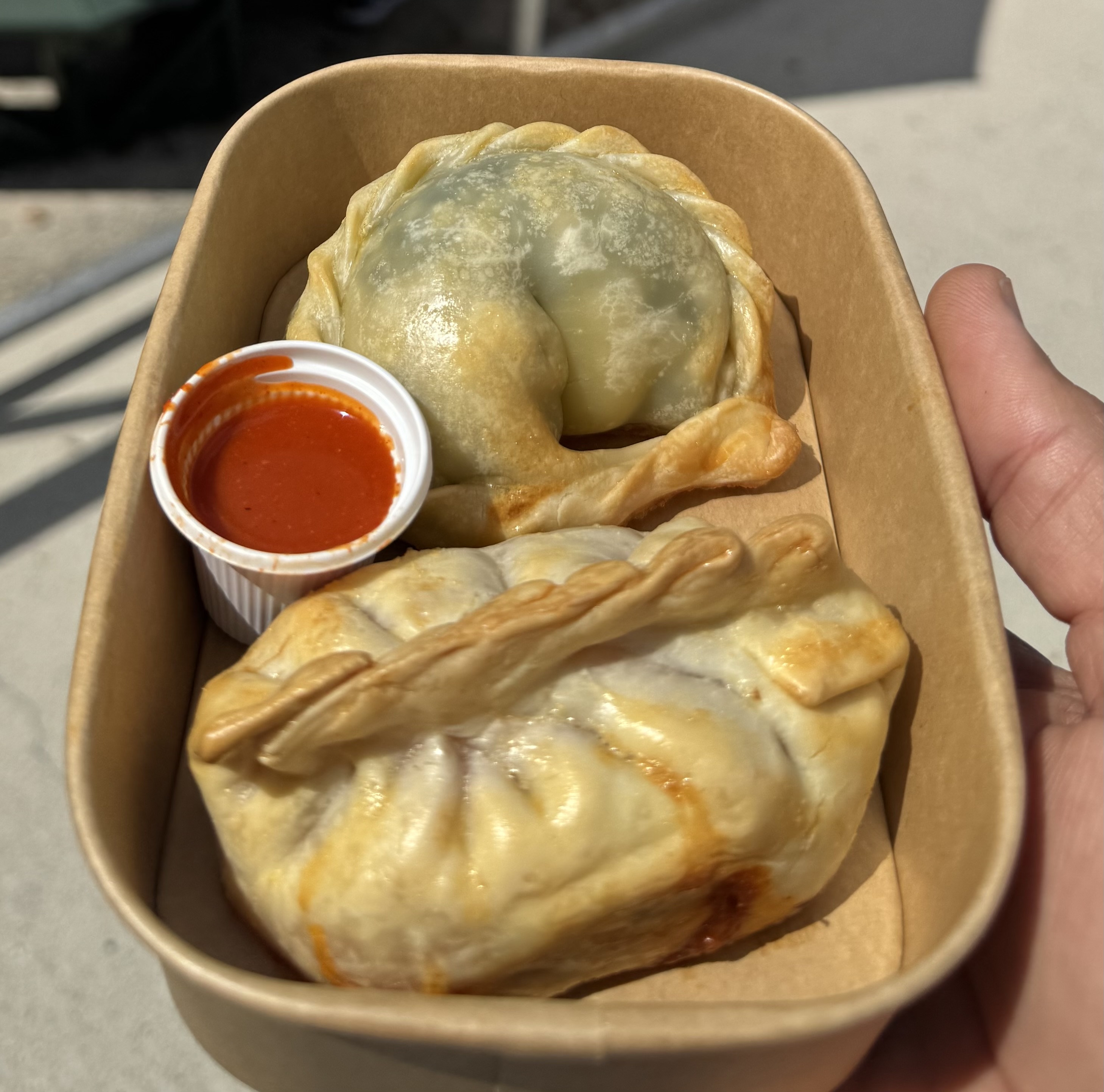 Empanada - Authentic Argentinian empanada — choose your flavor, or go for the Buy 5 Get 1 Free deal and mix & match 6! available at Pickle Bites Hollywood FL