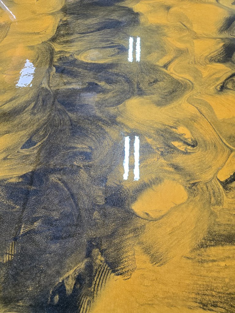 Gold and black metallic epoxy floor Bay Area epoxy contractor
