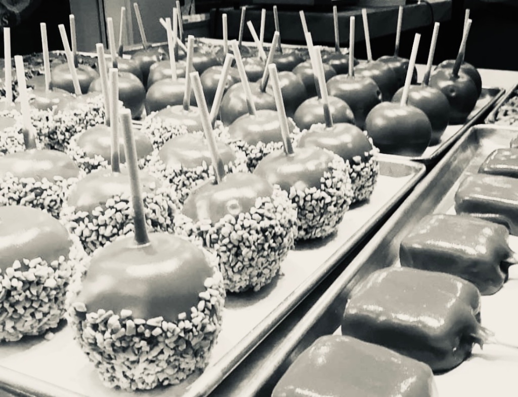 A tray of gourmet caramel apples
