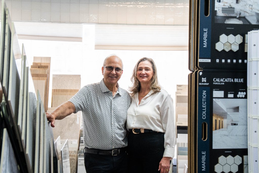 The owners of Decora Tile and Stone standing in front of their Old Bridge, NJ showroom