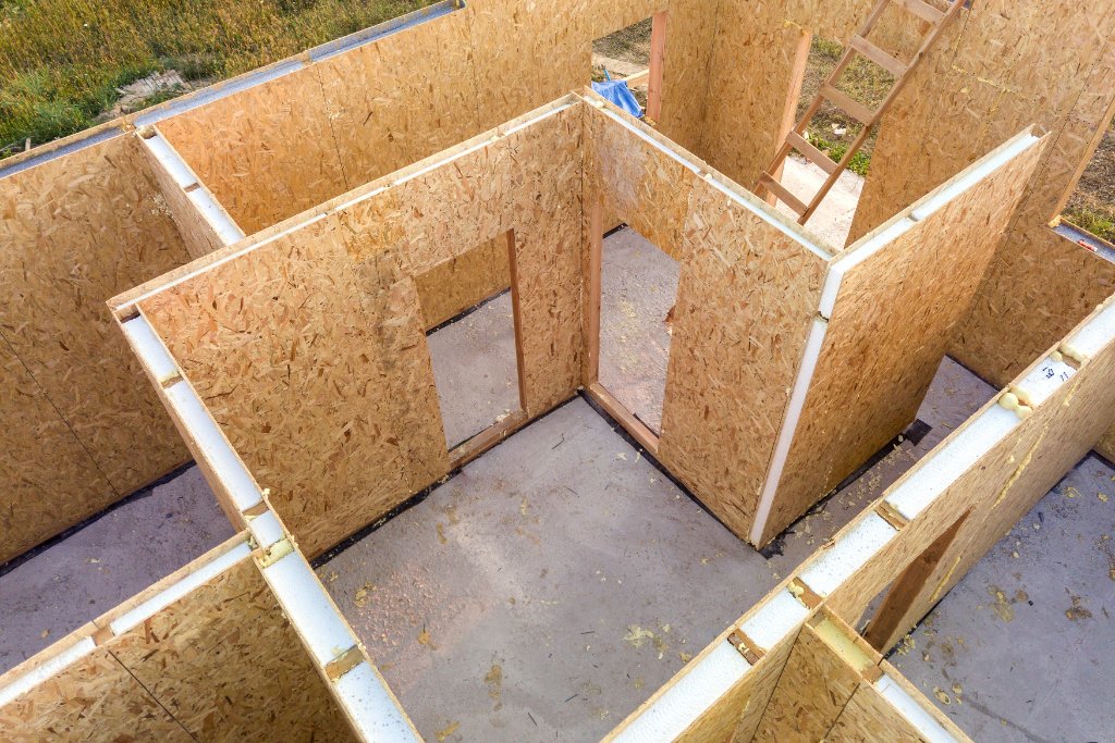 Modular building installation on screw pile foundation with BaseShield rodent barrier