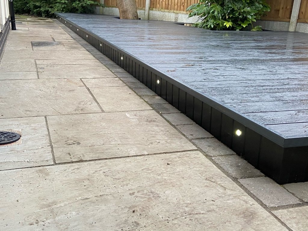 Composite decking frame with BaseShield mesh barrier preventing rodent access beneath structure