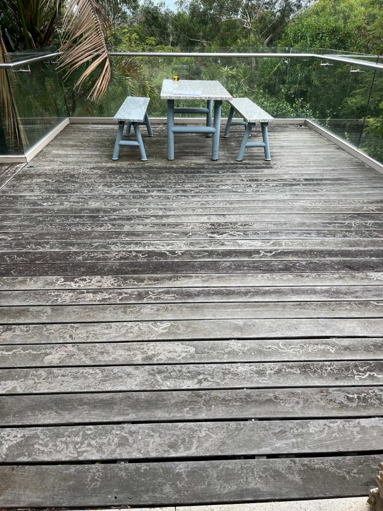 Merbau deck before restoration - dried out powdery grey surface