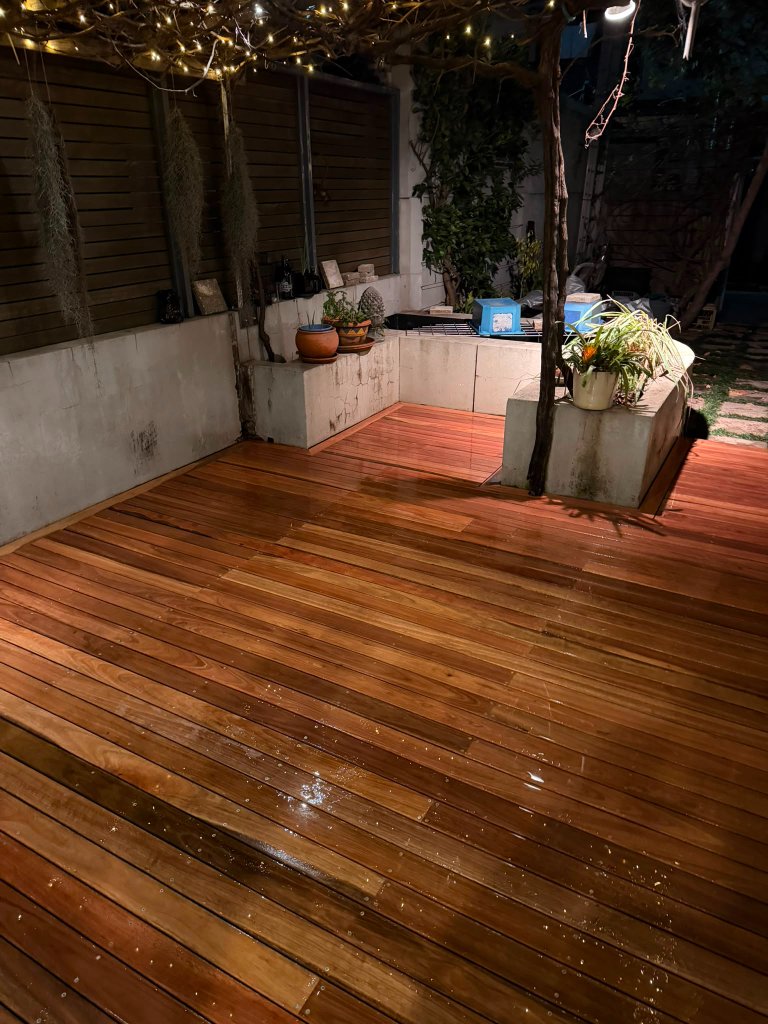Spotted Gum deck Surry Hills courtyard at night