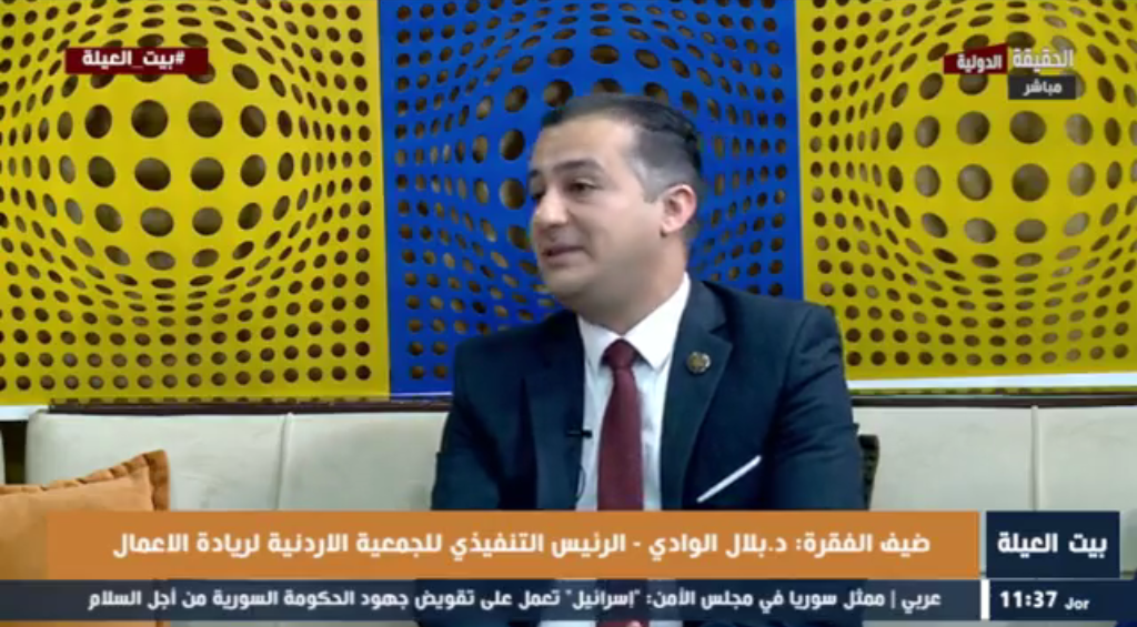 Dr. Belal AlWadi during a television interview on entrepreneurship and innovation