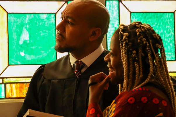 Scene with stained glass background