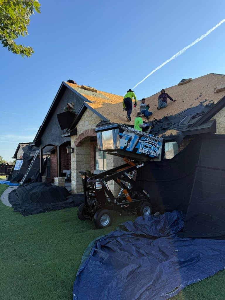 Crew at work on a full tear-off