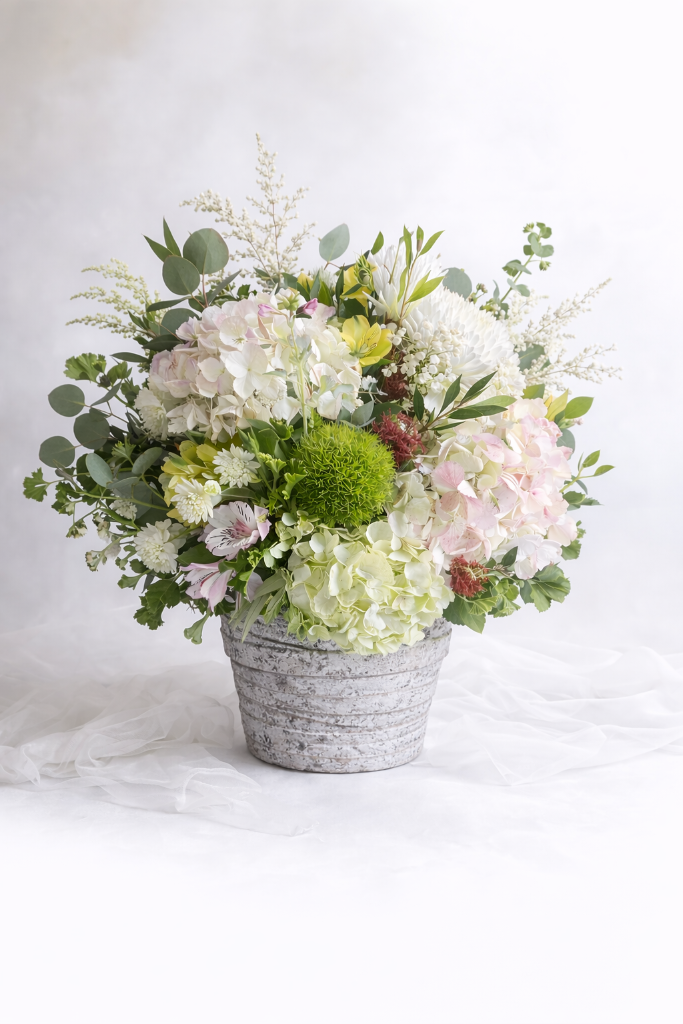 standard: Garden Whisper Arrangement — white sympathy sympathy flower arrangement delivered same-day in Las Vegas NV | Bud Weismiller Flowers