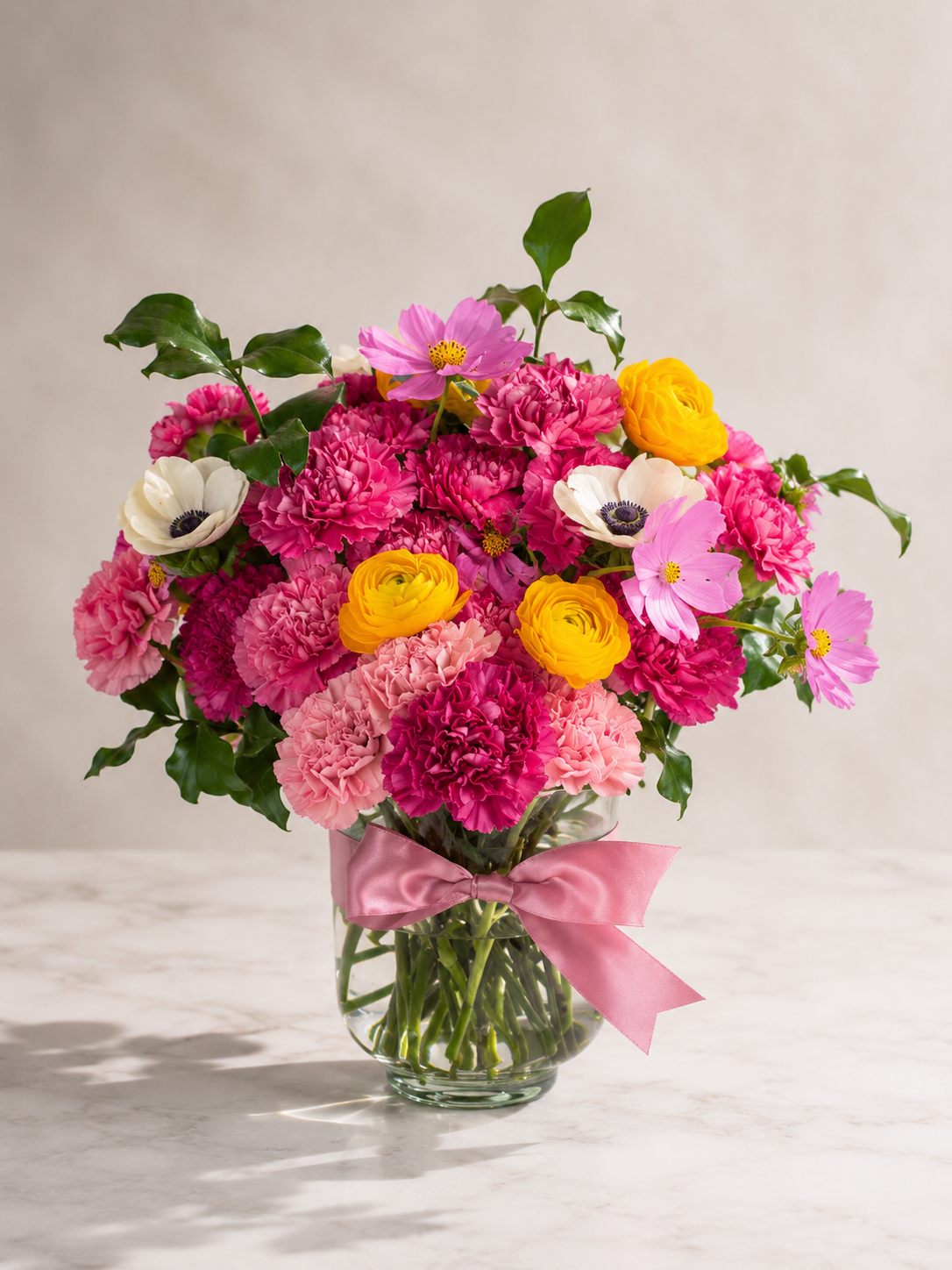 standard: Romantic, one-of-a-kind anniversary floral masterpiece created with premium red and pink blooms by a top Las Vegas florist.