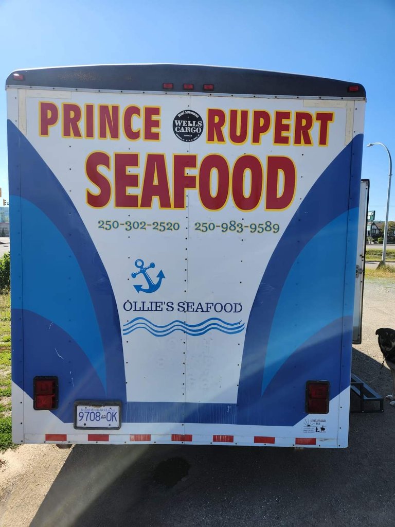 Back of the Wells Cargo trailer branded Prince Rupert Seafood