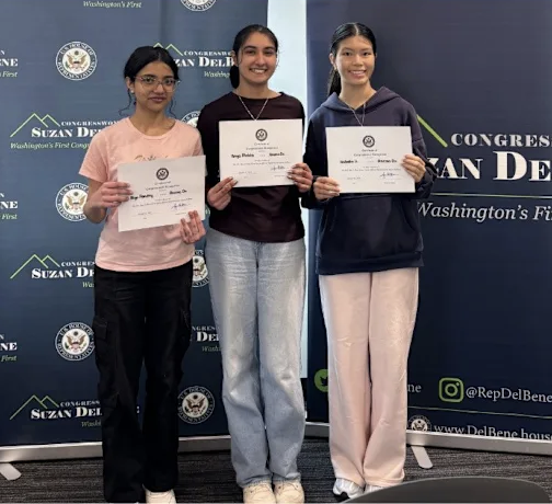 STEMSCI capstone team Anemo Dx holding Congressional certificates with Congresswoman Suzan DelBene