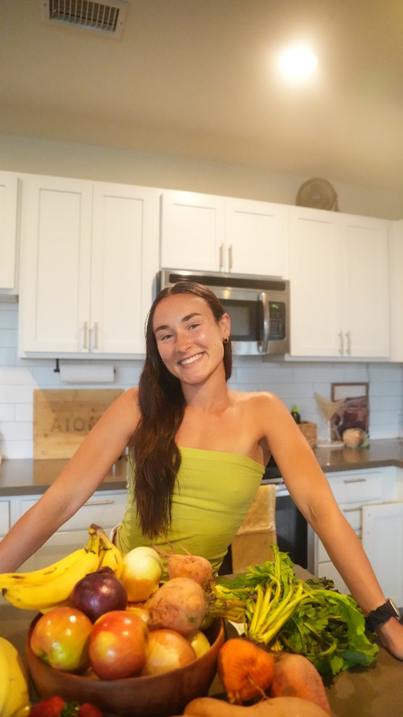 Erin in the kitchen with fresh produce
