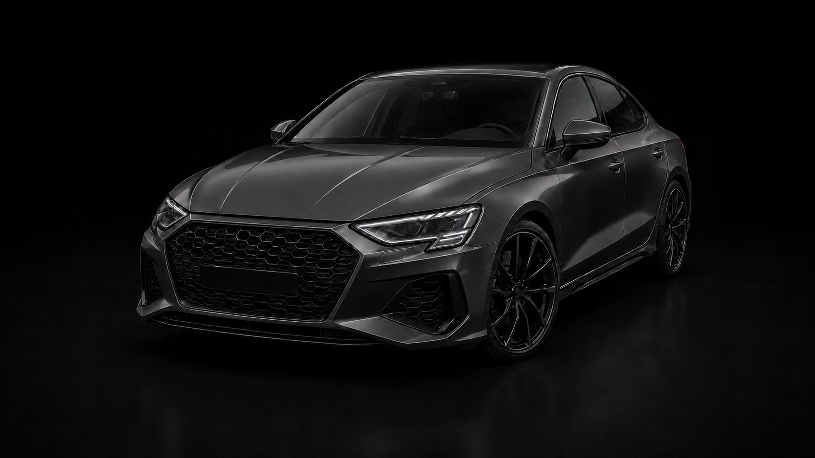 Studio view of a dark grey Audi sedan used to reveal Full Front-End PPF coverage areas