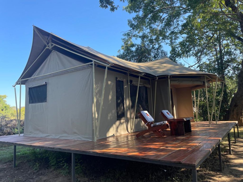 Group of guests enjoying the bush camp