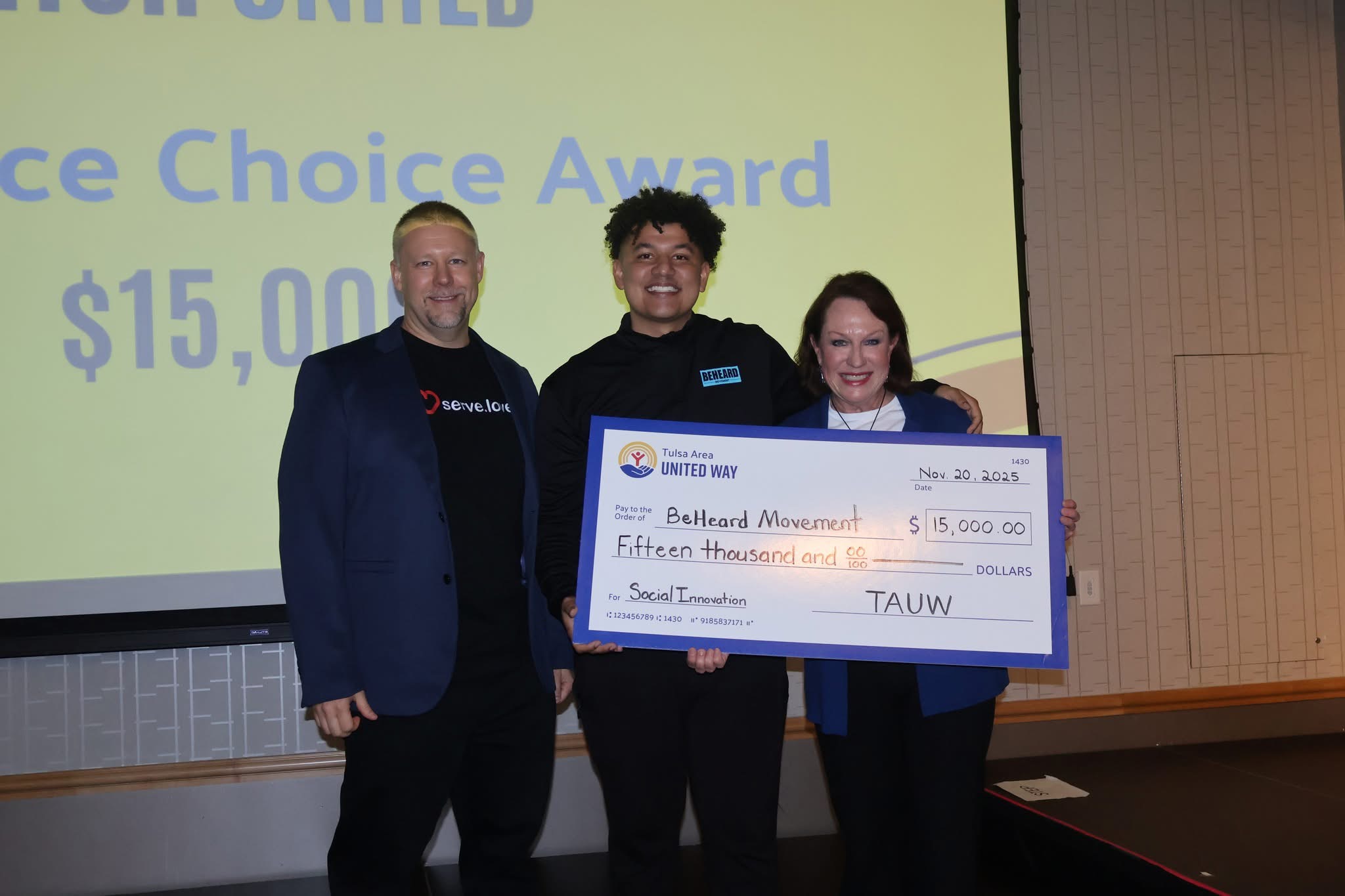 BeHeard Movement accepting the $15,000 People's Choice Award check from Tulsa Area United Way
