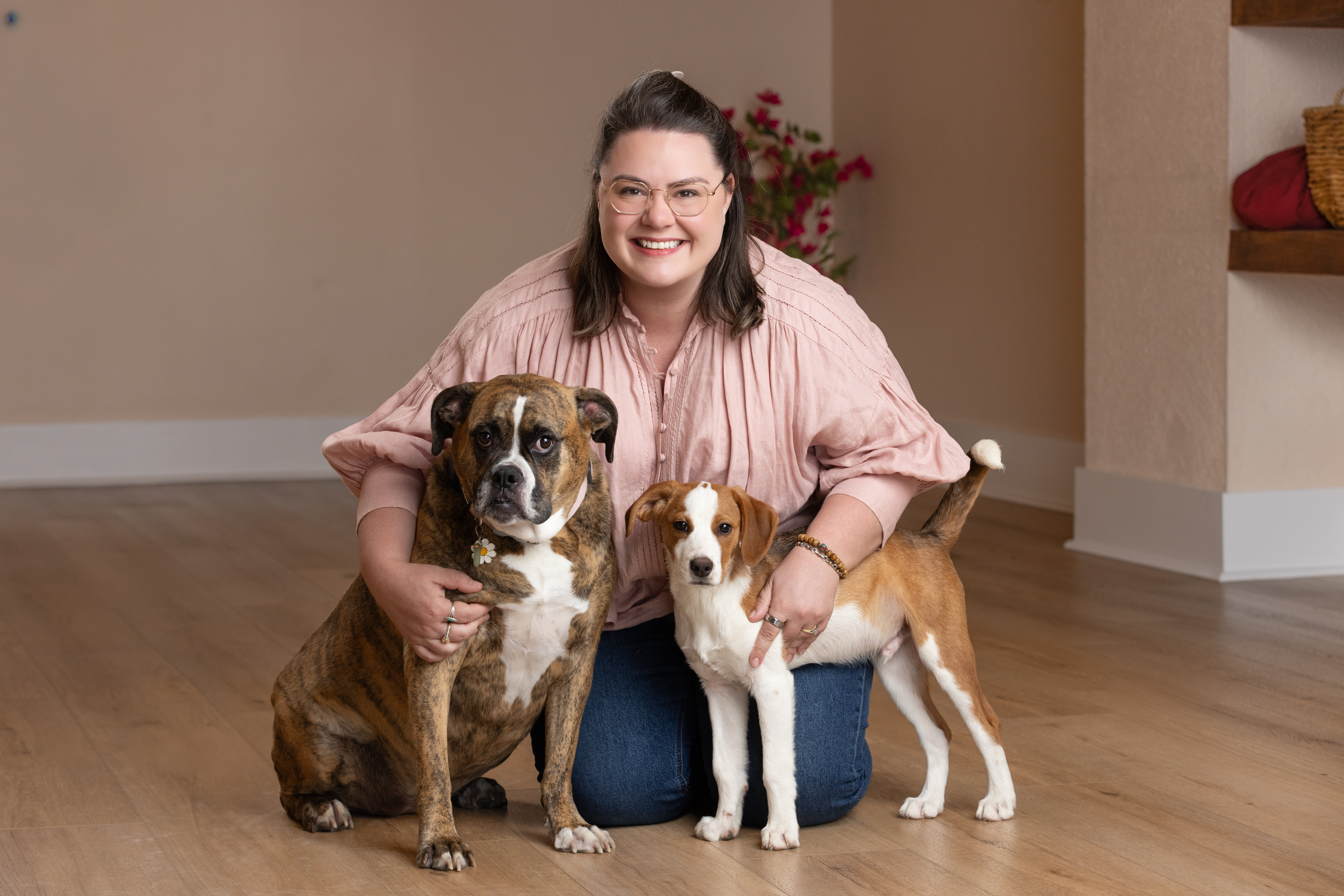 Paula with Bailey and Bruno, the studio's unofficial dog emotional support animals