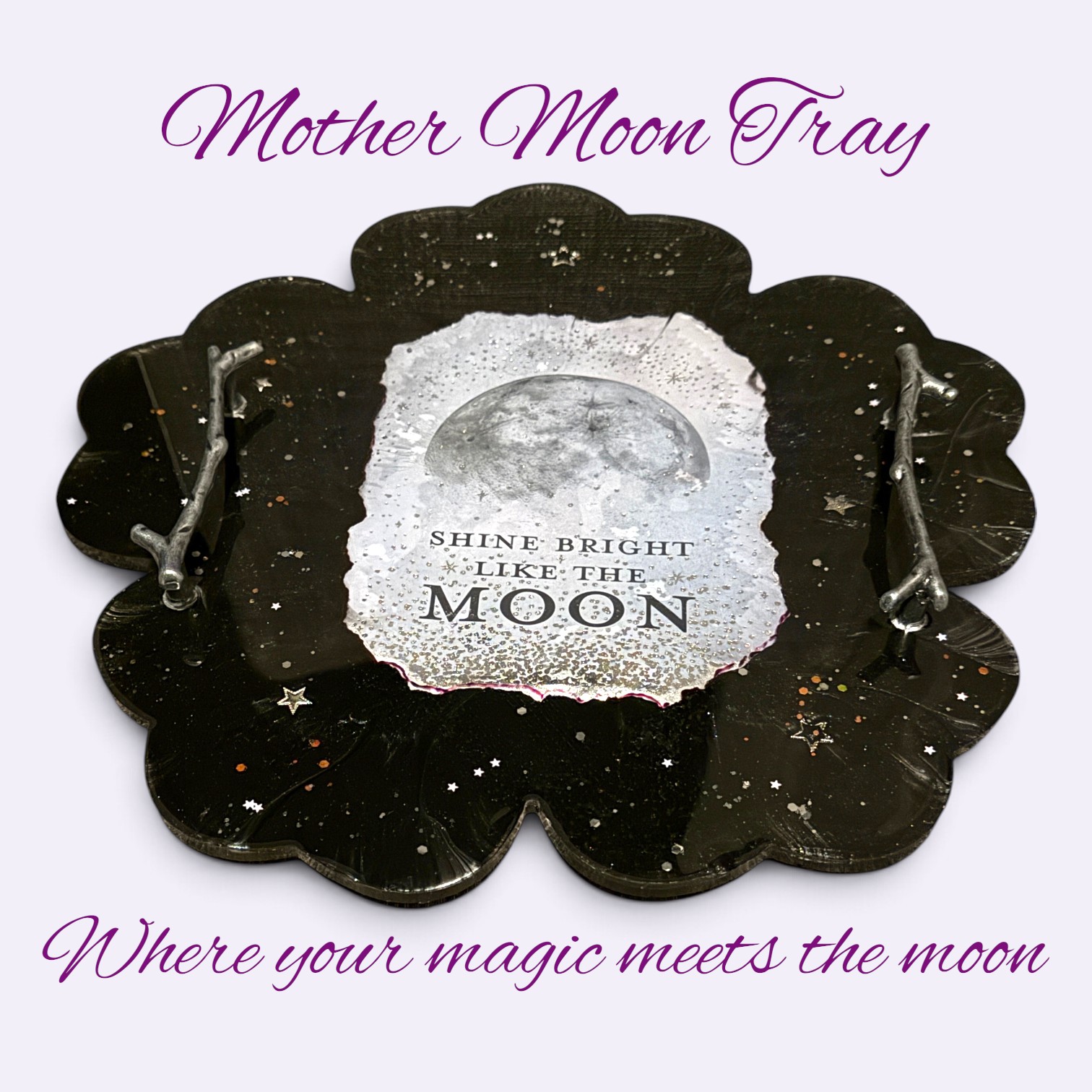 Mother Moon Tray - glossy black resin tray with scalloped edges, silver branch handles, star-speckled night sky, and a bold moon graphic reading SHINE BRIGHT LIKE THE MOON