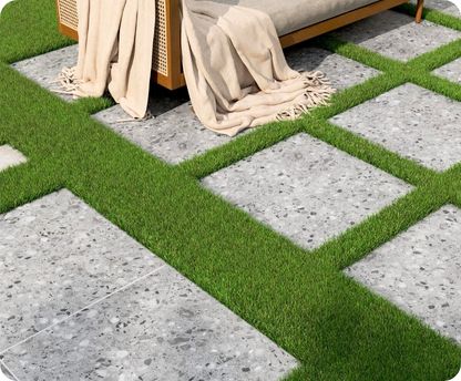 Artificial turf installation with decorative pavers — modern outdoor living space