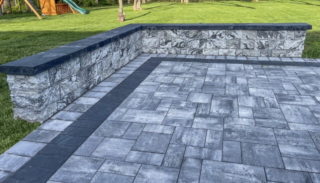 Stone patio with retaining wall
