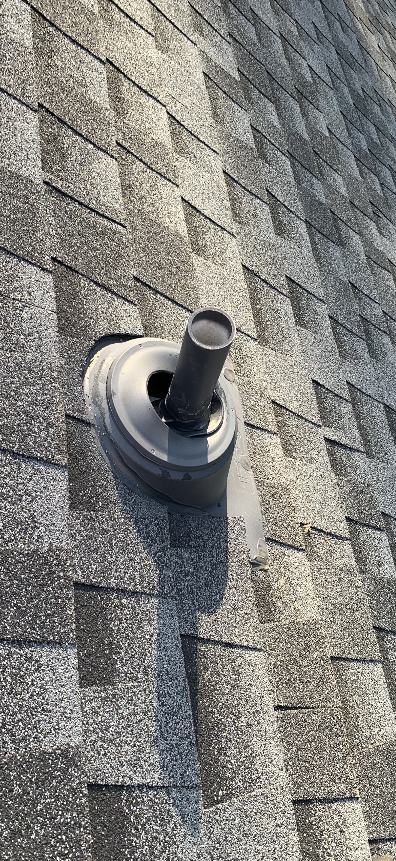 Cracked plumbing vent boot found during a roof leak inspection