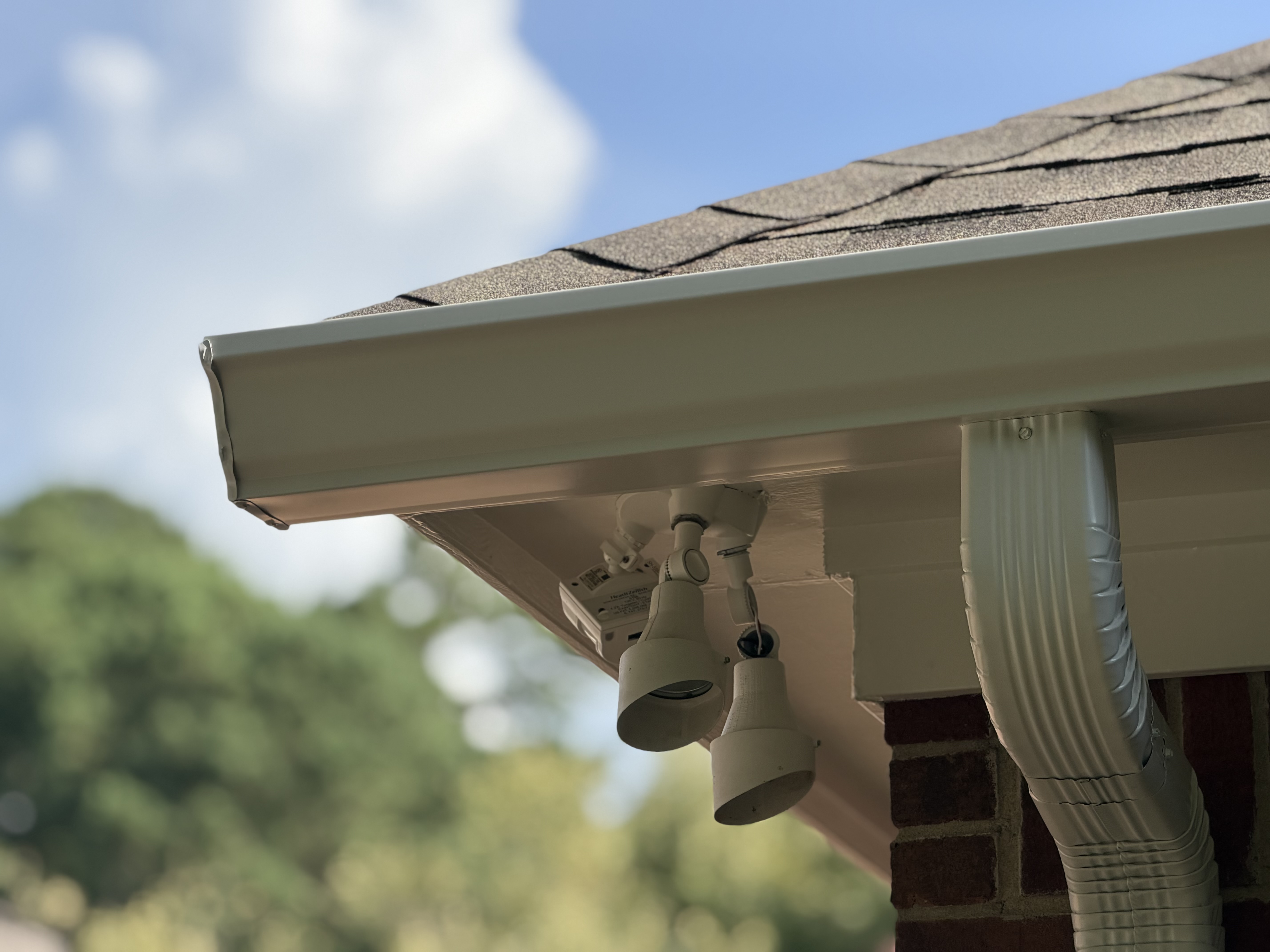 New gutter and soffit with mounted security lights