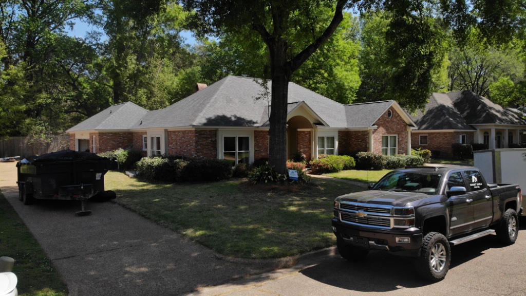 Completed home — Summit Shield sign in yard