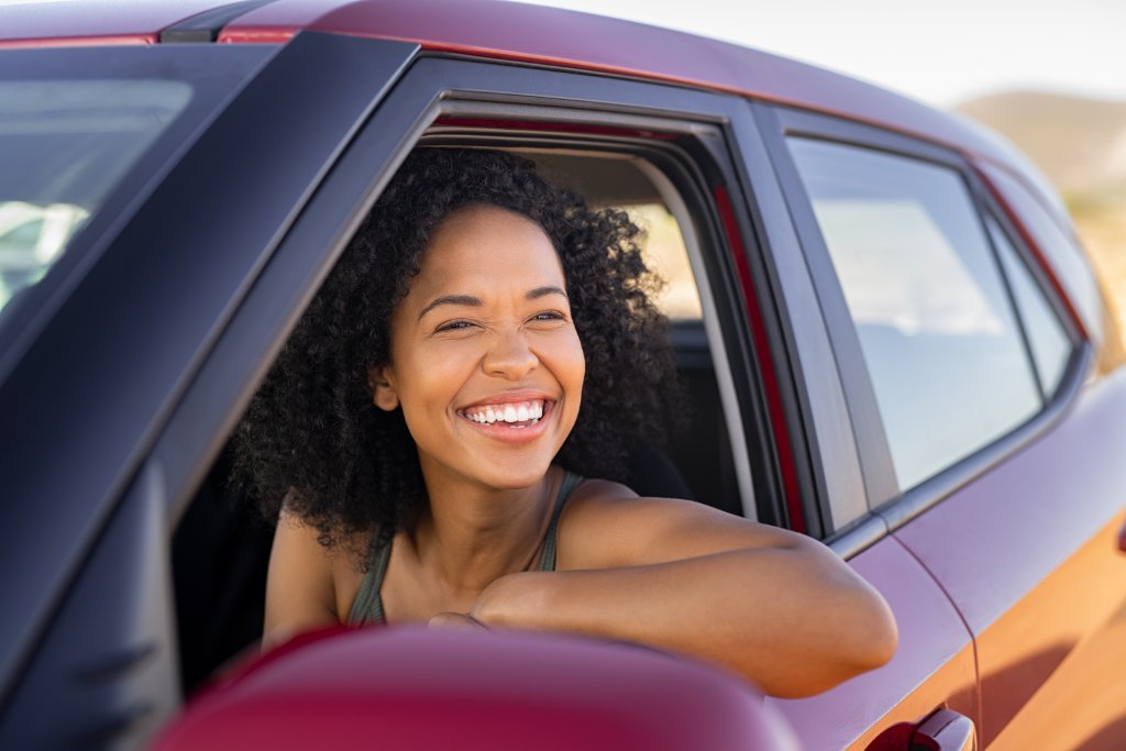 Woman smiling in car