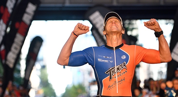 Coach mentoring athlete through mental performance training