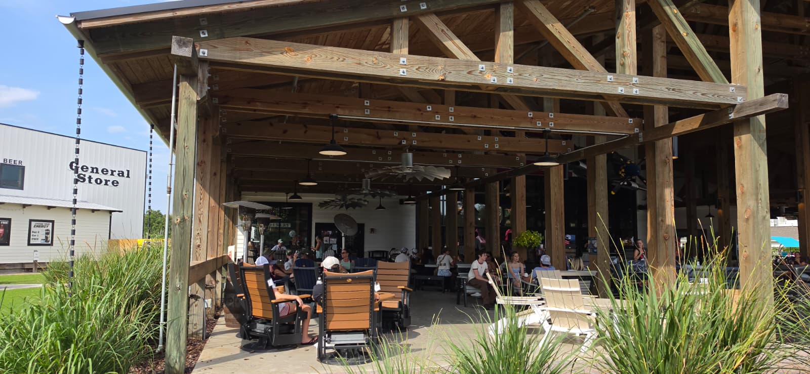 Guests gathering beneath the timber pavilion at Props Brewery