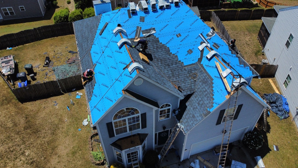 Shingles being installed — Raleigh, NC · May 2026