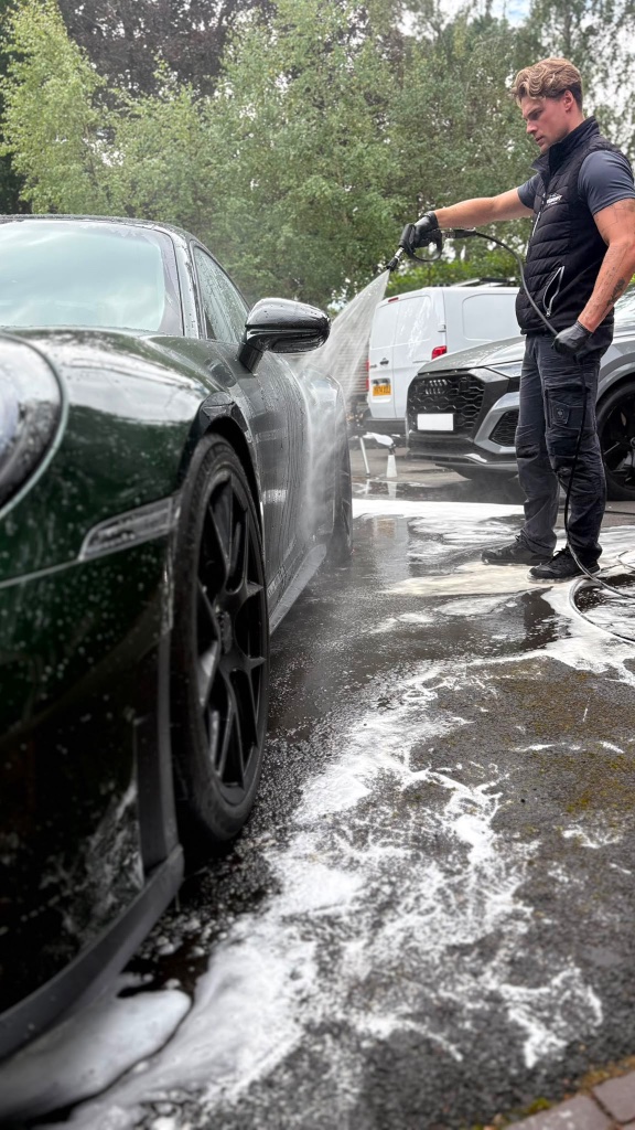 Charlie detailing a Porsche 911