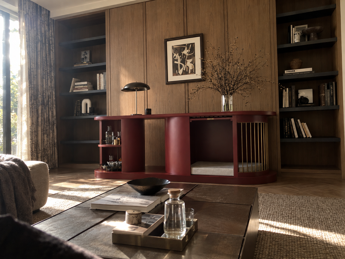 Burgundy living-room credenza combining open shelving with a brass-fronted resting enclosure