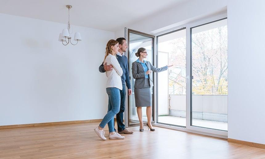 A local provider discussing a property with a homeowner during a consultation