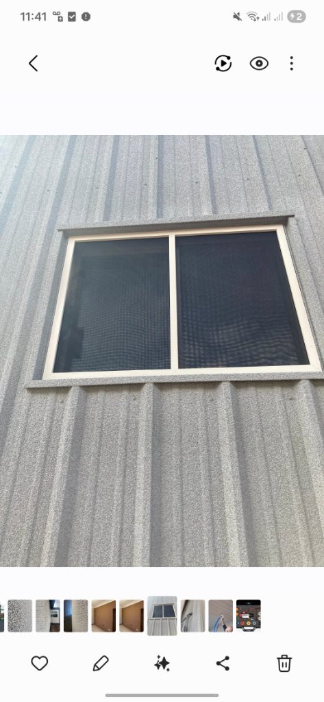 VIPEQ cork spray insulation applied to metal cladding building