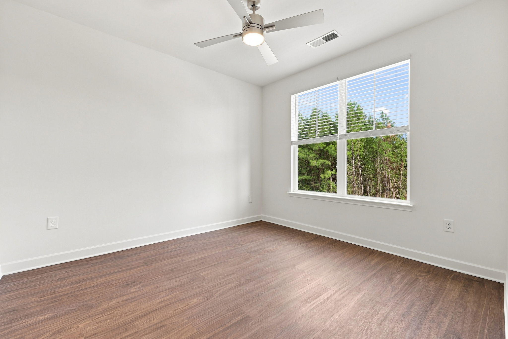 Bedroom with large window