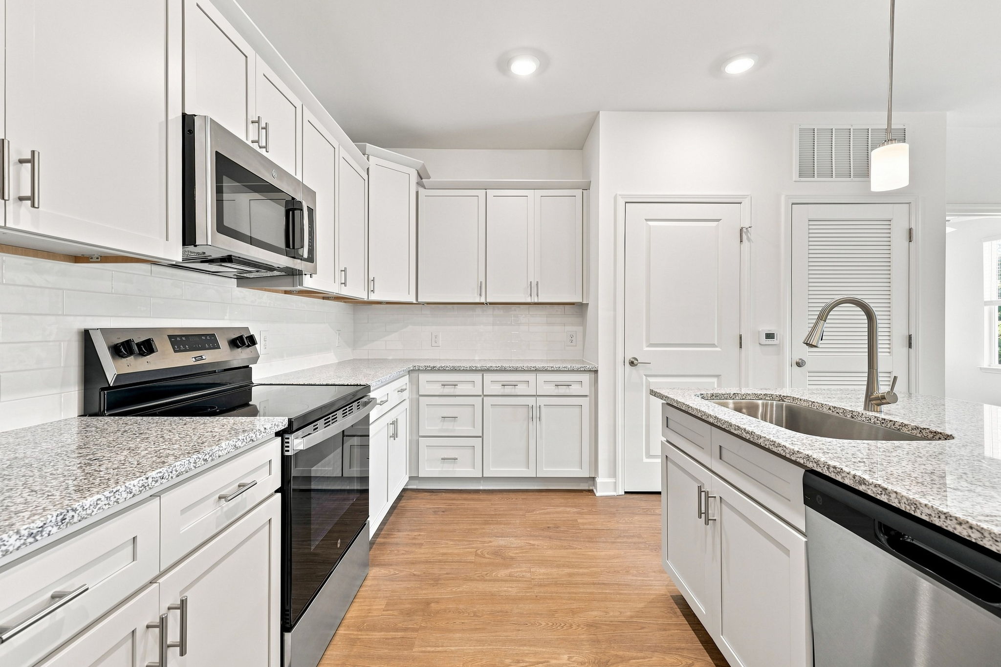Modern kitchen with stainless steel appliances