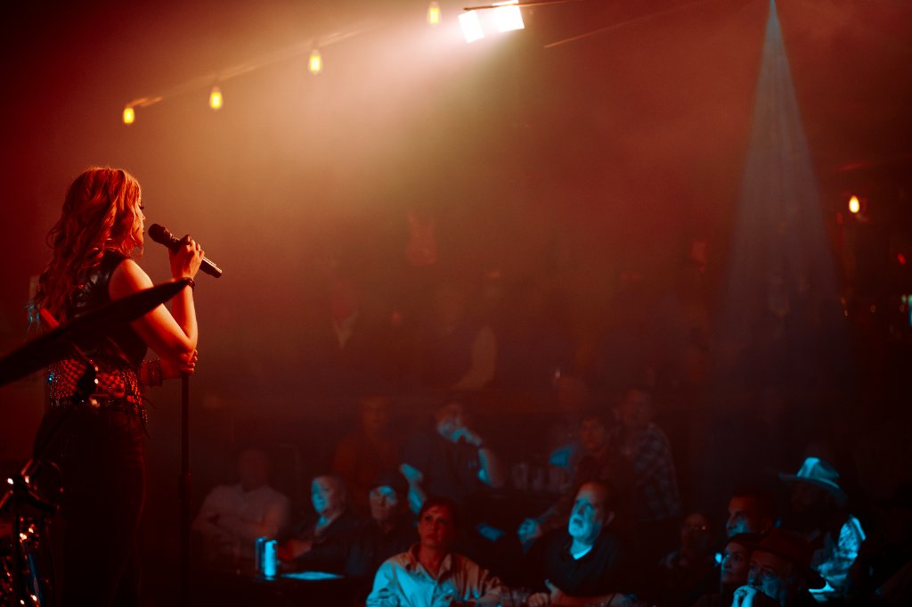 Kate Watson singing to the crowd